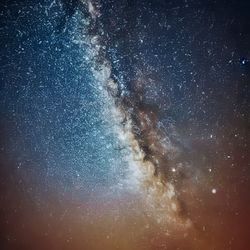 Scenic view of sea against sky at night