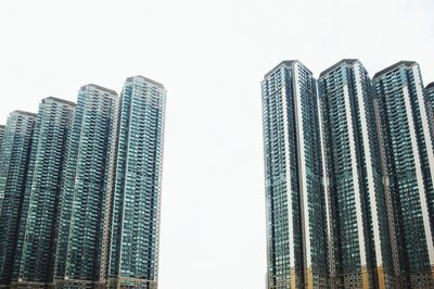 Low angle view of modern buildings against clear sky