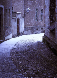 Snow covered brick wall