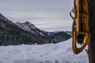 Snow covered mountains against sky