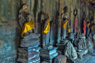 Panoramic view of buddha statue against wall