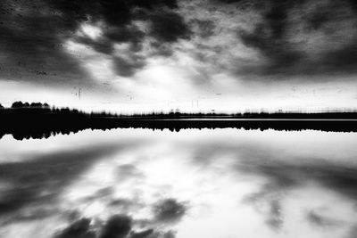 Reflection of cloudy sky in water