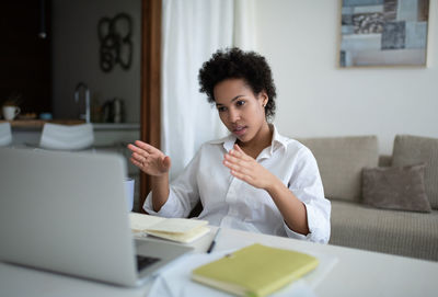 African american freelancer making video call