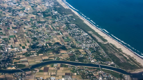 Aerial view of city against sky