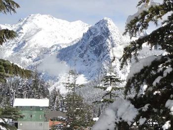 Scenic view of snow covered mountains