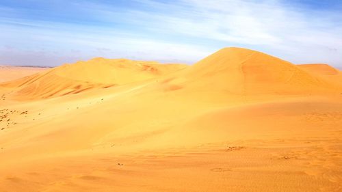 Scenic view of desert against sky