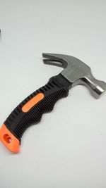Close-up of tools against white background