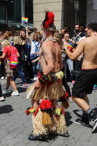 Group of people at street in city