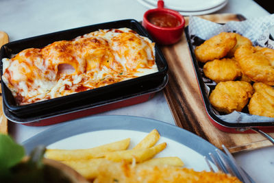 High angle view of food served on table