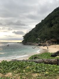 Scenic view of beach against sky