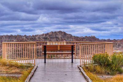 Built structure on landscape against sky