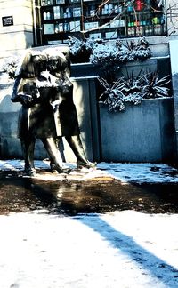 Statue of horse on snow