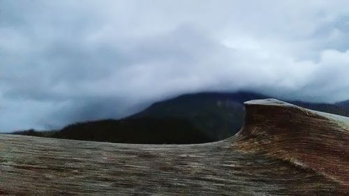 Scenic view of sea against sky during rainy season