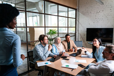 Group of people sitting at table