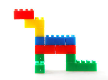 Close-up of toys against white background