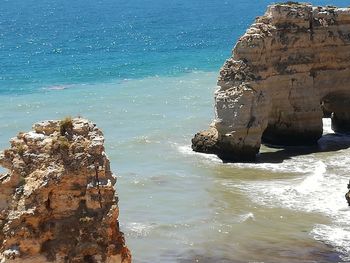 Scenic view of sea against blue sky