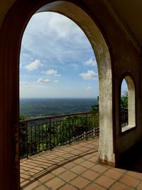Scenic view of sea against sky seen through window
