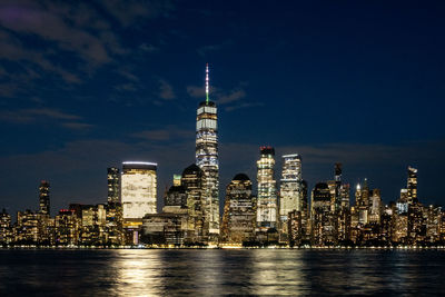 Illuminated buildings in city at night