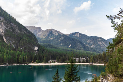 Scenic view of lake and mountains against sky