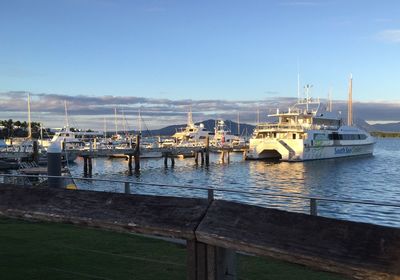 Boats moored at harbor