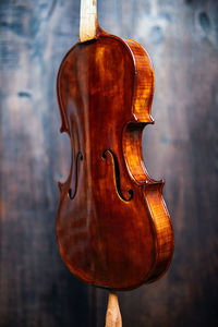 Close-up of figurine on wood