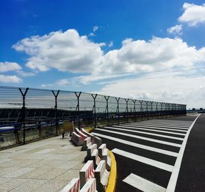 Road against cloudy sky