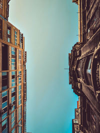 Low angle view of buildings against sky