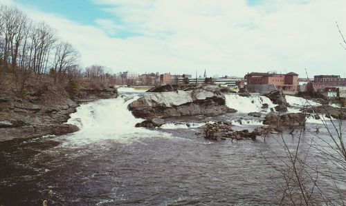 View of river against cloudy sky