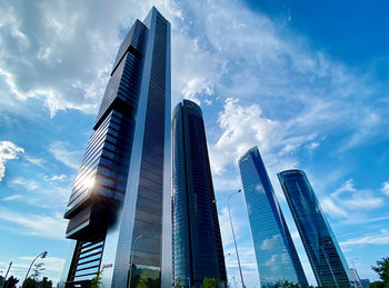 Low angle view of modern buildings against sky