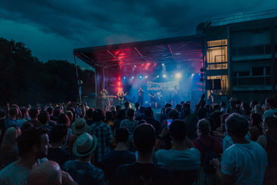 Crowd at music concert at night