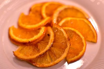 High angle view of orange slice in plate on table