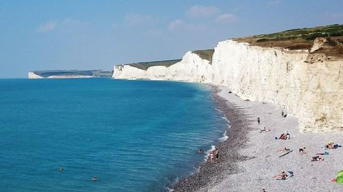 Panoramic view of sea against blue sky