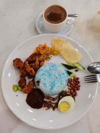 High angle view of breakfast served on table