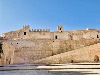 View of fort against clear blue sky