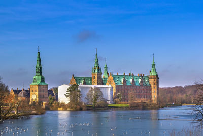 View of frederiksborg slot from lake, denmark