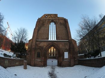 Built structure against clear sky during winter