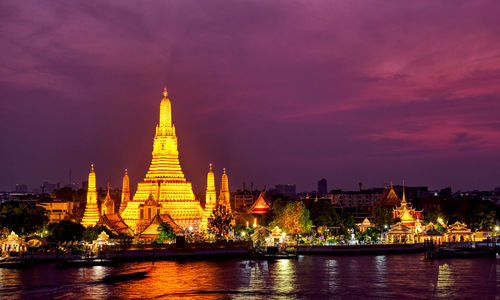 Illuminated buildings at waterfront