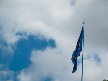 Low angle view of european union flag against sky