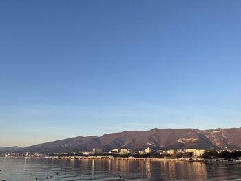 Scenic view of sea against clear blue sky