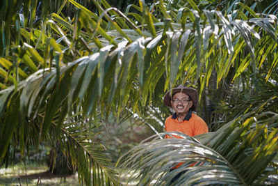 Portrait of smiling man standing outdoors