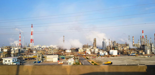 Panoramic view of factory against sky