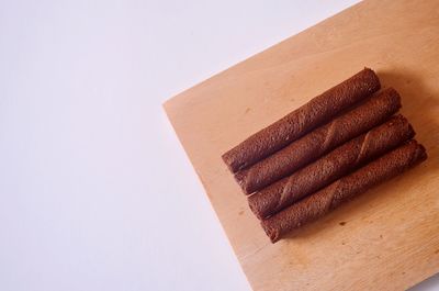 High angle view of bread on cutting board