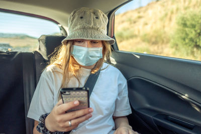 Portrait of man in car
