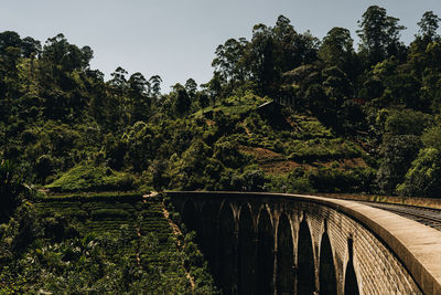 Arch bridge against sky