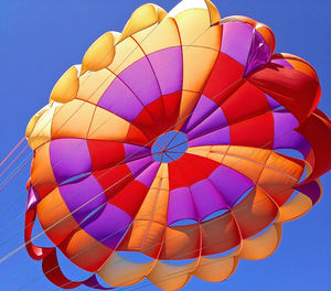 Low angle view of hot air balloons against sky