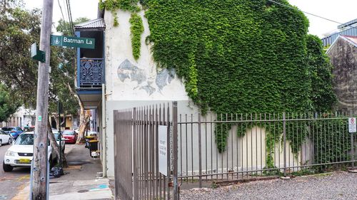 Road sign on street in city