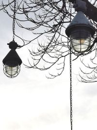 Low angle view of street light against sky