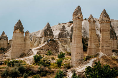 Panoramic view of rock formations against sky