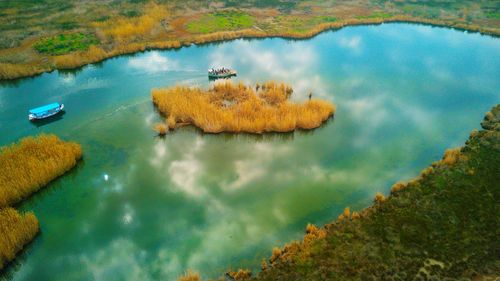 High angle view of lake by autumn trees