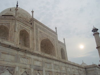 View of historical building against cloudy sky